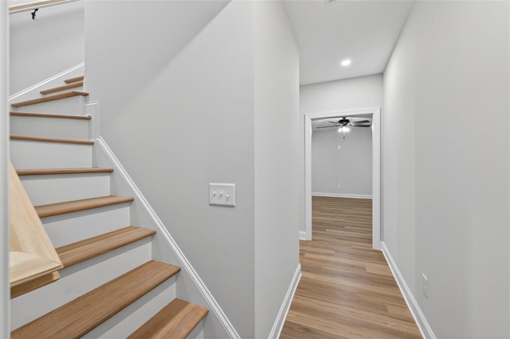 3110 Flatbottom Road Ball Ground, GA 30107 - Photo 55 of 89 a view of a hallway with wooden floor and entryway