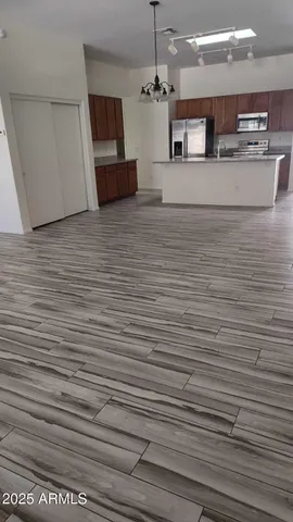 a view of a kitchen with a sink