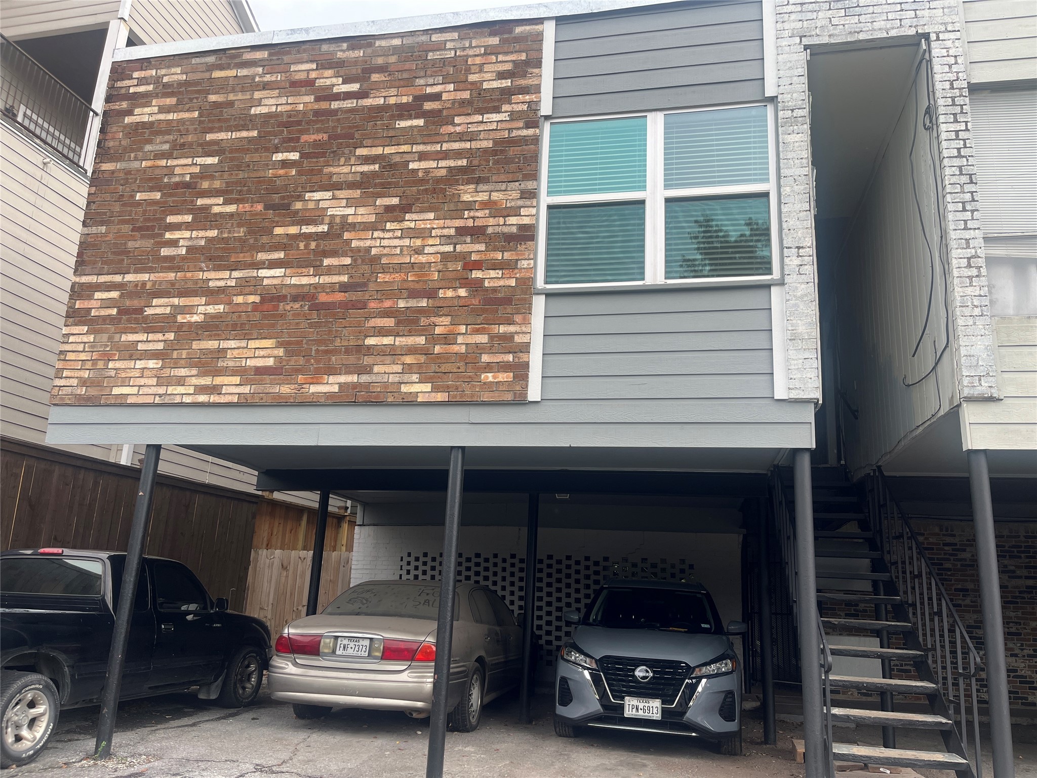 4626 Bell Street, Unit 4 Houston, TX 77023 - Photo 2 of 10 a car parked in front of a building