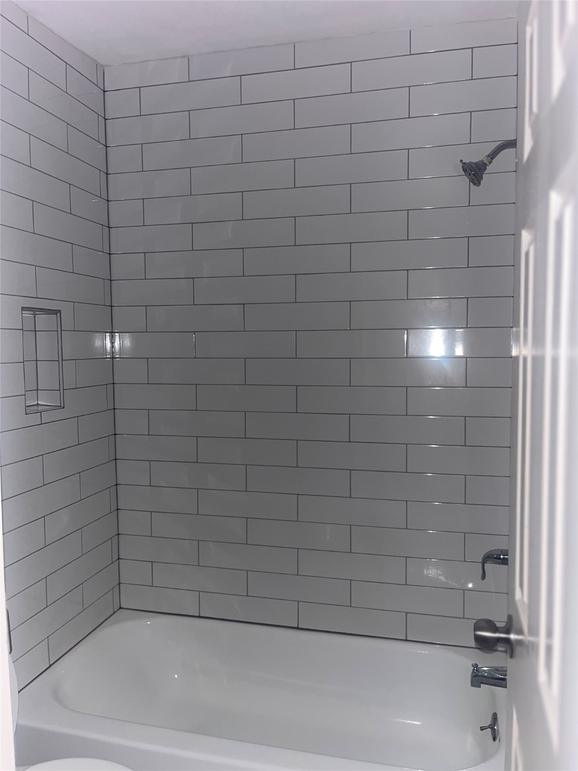 4626 Bell Street, Unit 4 Houston, TX 77023 - Photo 10 of 10 a bathroom with a shower