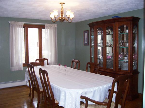 3 Greybirch Road Andover, MA 01810 - Photo 4 of 13 a view of a dining room with furniture window and wooden floor