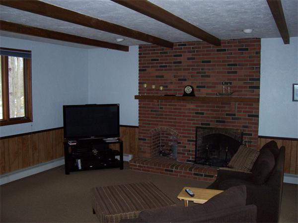3 Greybirch Road Andover, MA 01810 - Photo 7 of 13 a living room with furniture and a flat screen tv