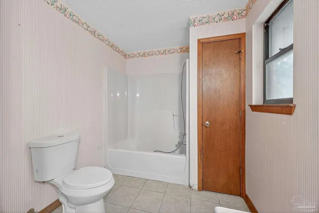 a bathroom with a sink a vanity and a mirror