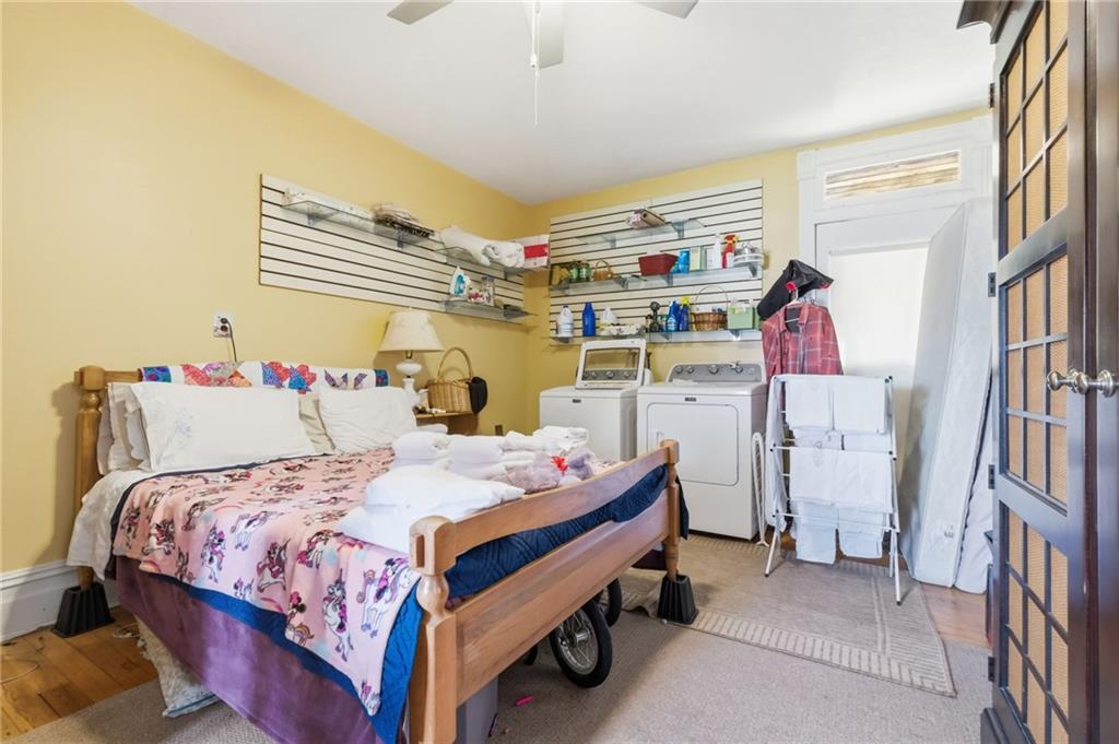 156 Rockdale Road Rockwood, PA 15557 - Photo 18 of 35 a bed room with a bed and a book shelf