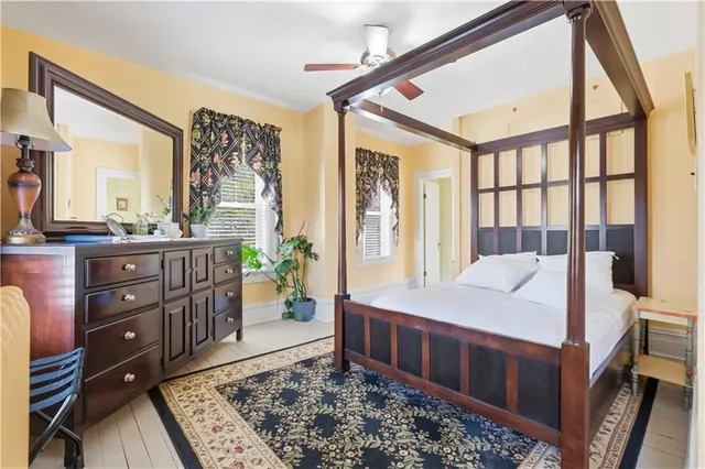 a bed room with a bed and a dresser