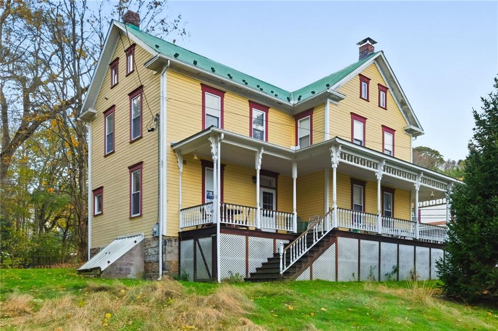 156 Rockdale Road Rockwood, PA 15557 - Photo 28 of 35 front view of a house with a yard