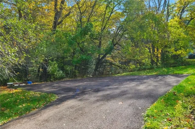 a view of outdoor space with deck and yard