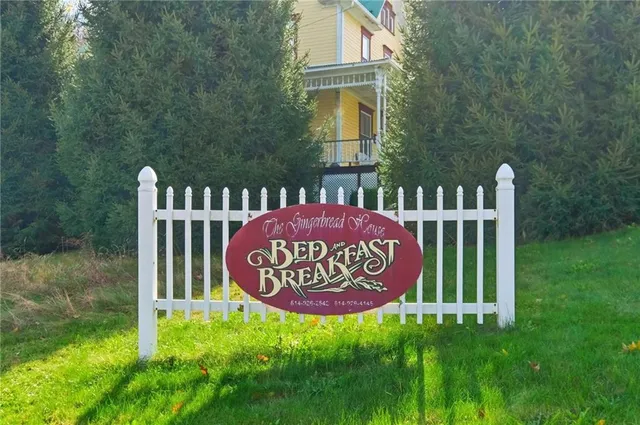 a sign on the side of the road