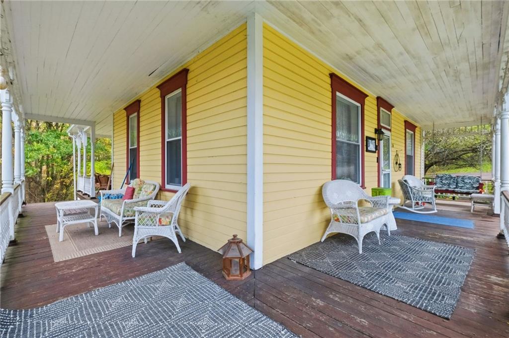 156 Rockdale Road Rockwood, PA 15557 - Photo 4 of 35 a view of a dining room with furniture and wooden floor