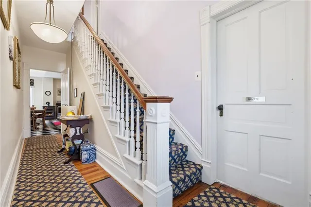 a view of entryway with wooden floor
