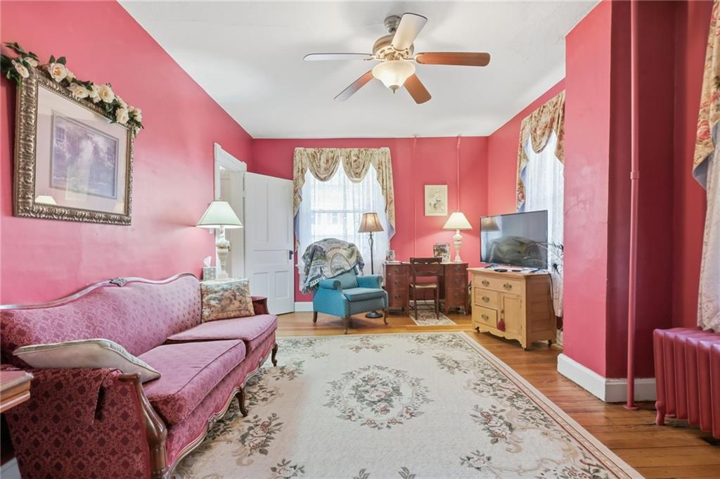 156 Rockdale Road Rockwood, PA 15557 - Photo 8 of 35 a living room with furniture a large window with wooden floor