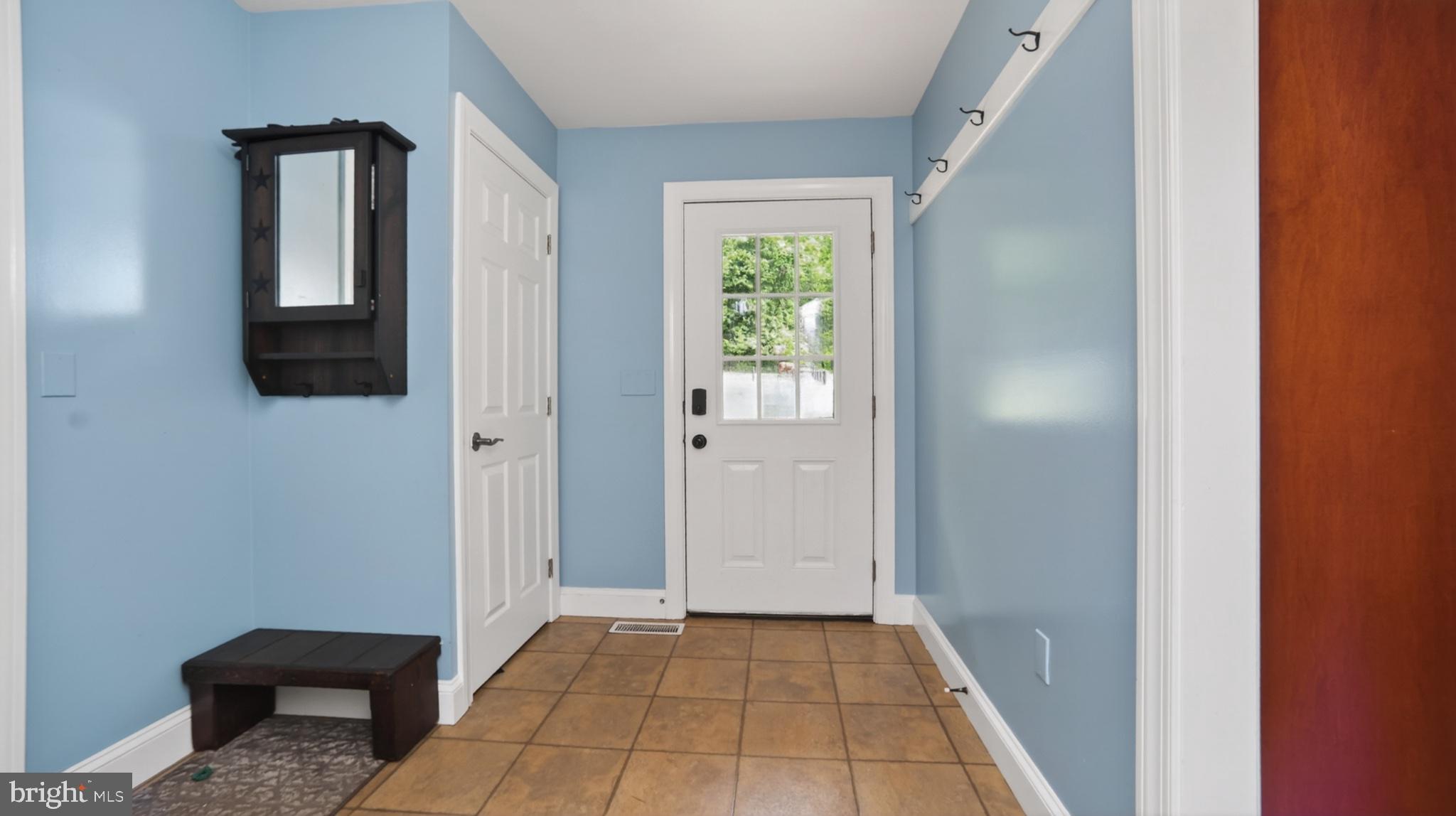 5325 Hammond Road New Holland, PA 17557 - Photo 8 of 73 Inviting entryway with serene blue hues.