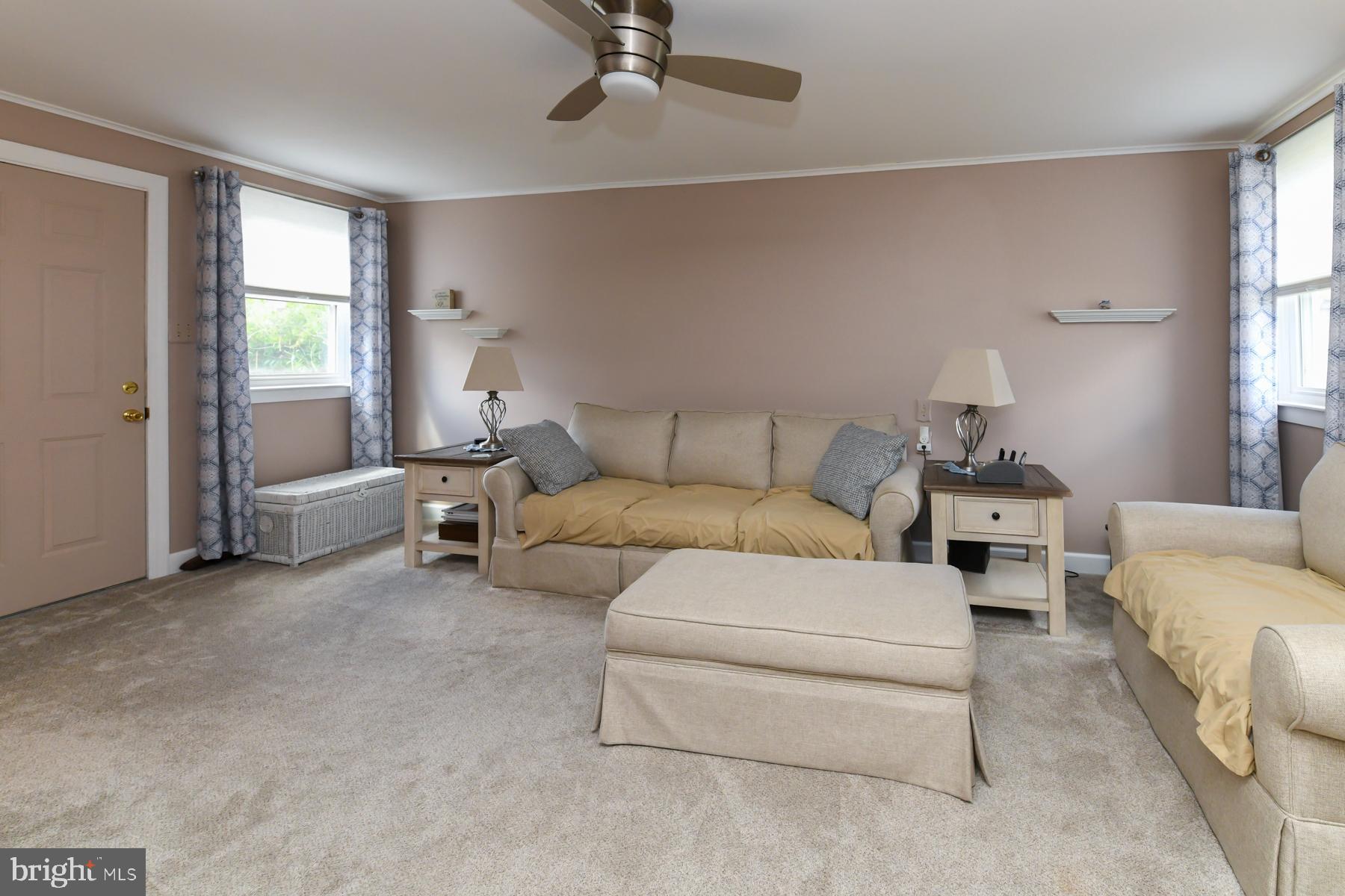 21 Hiawatha Road Somerdale, NJ 08083 - Photo 11 of 22 a living room with furniture and a window