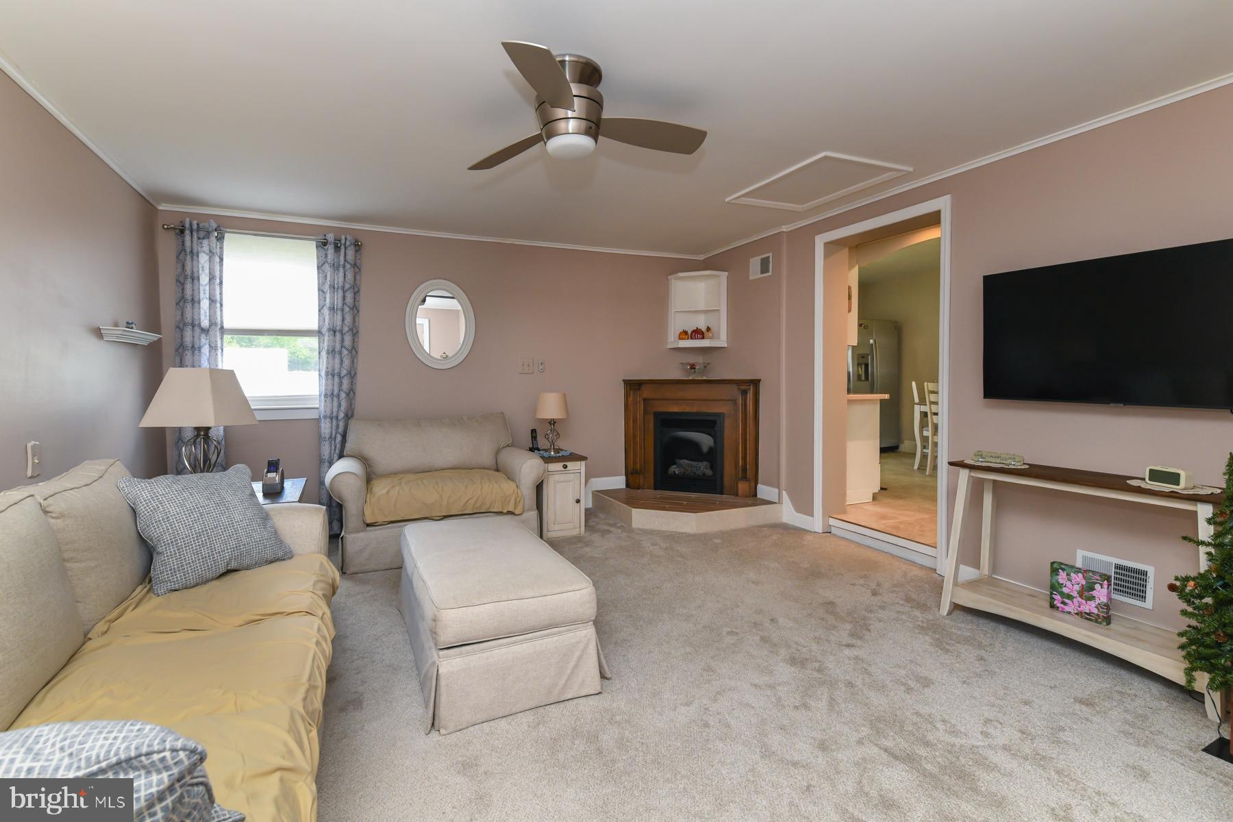 21 Hiawatha Road Somerdale, NJ 08083 - Photo 12 of 22 a living room with furniture and a flat screen tv