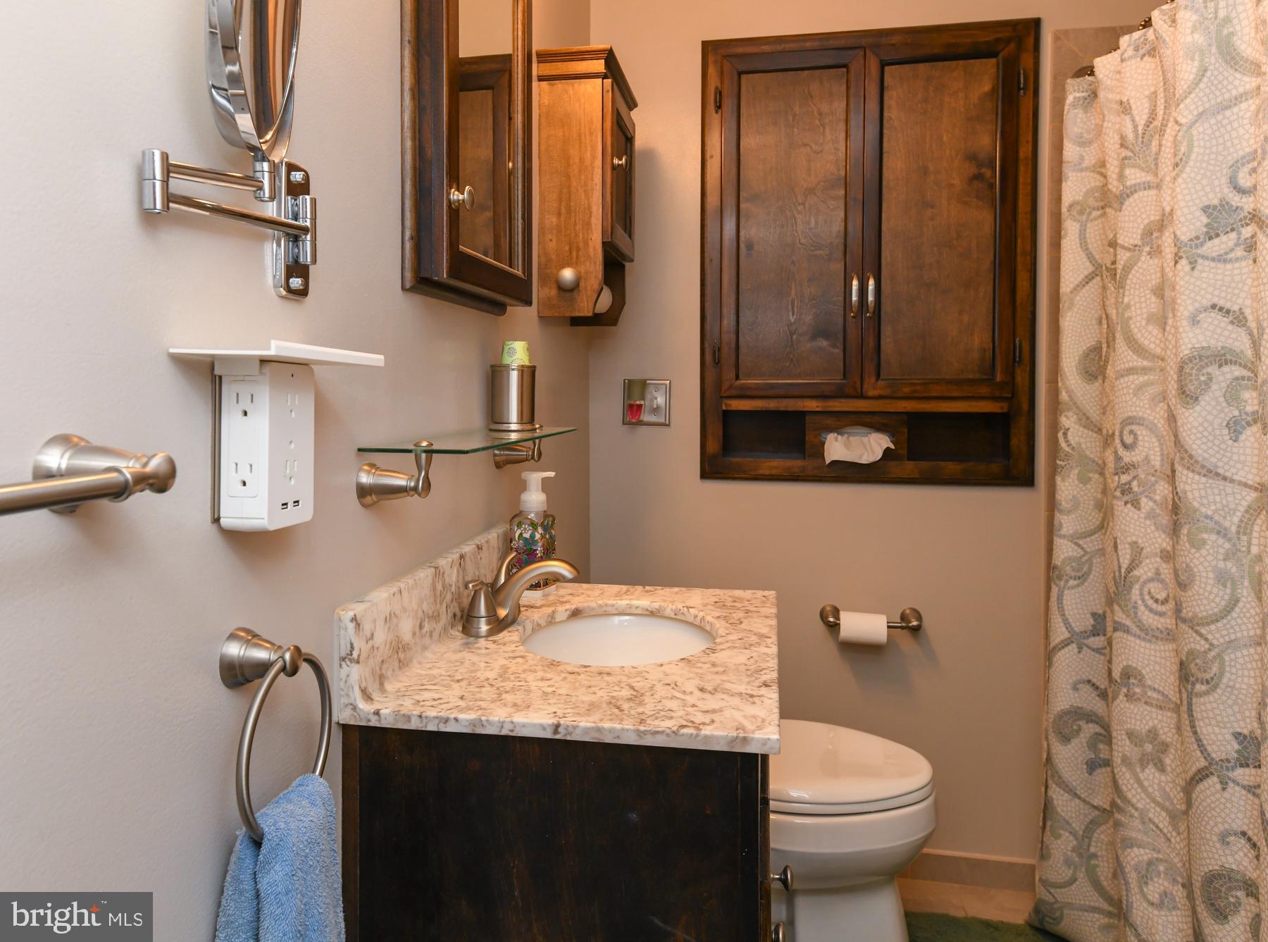 21 Hiawatha Road Somerdale, NJ 08083 - Photo 19 of 22 a bathroom with a granite countertop sink and a toilet