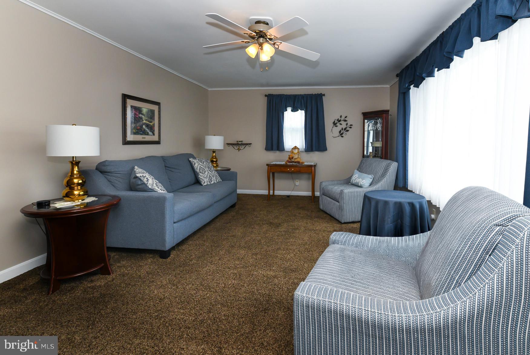 21 Hiawatha Road Somerdale, NJ 08083 - Photo 5 of 22 a living room with furniture and a chandelier