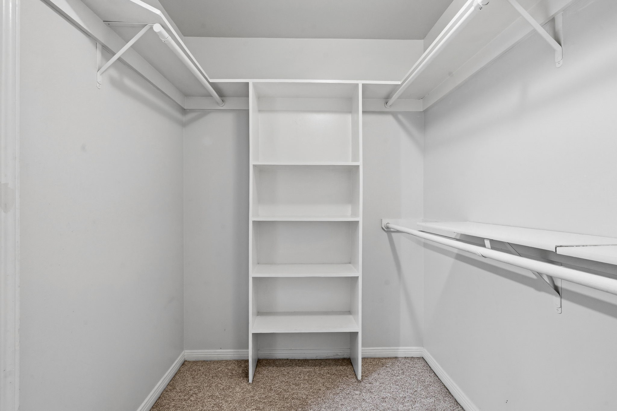 3525 Sage Road, Unit 504 Houston, TX 77056 - Photo 11 of 18 A spacious walk-in closet with well-appointed shelving, offering ample room for effortless organization and a clean, streamlined feel.javascript:__doPostBack('m_ucDetailsView$m_btnSave','')