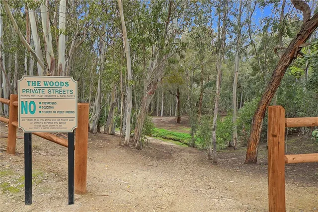 a view of a chairs and table in the back yard