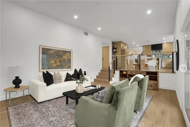 a living room with furniture and a couch