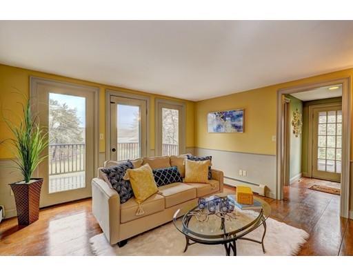 392 South Main Street Cohasset, MA 02025 - Photo 15 of 41 a living room with furniture and a large window