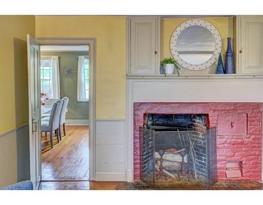392 South Main Street Cohasset, MA 02025 - Photo 16 of 41 a view of a livingroom with furniture and a fireplace