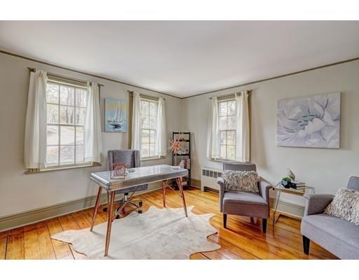 392 South Main Street Cohasset, MA 02025 - Photo 17 of 41 a living room with furniture a rug and a window
