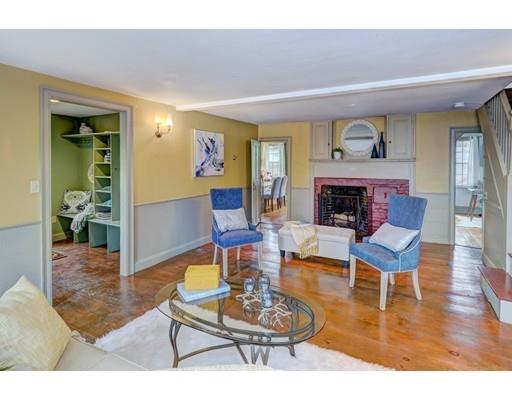 392 South Main Street Cohasset, MA 02025 - Photo 27 of 41 a living room with furniture and a fireplace