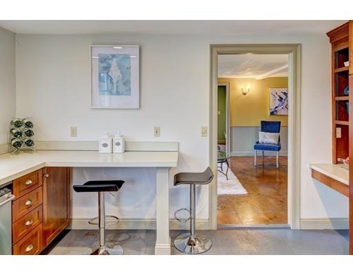 392 South Main Street Cohasset, MA 02025 - Photo 28 of 41 a kitchen with a table and chairs