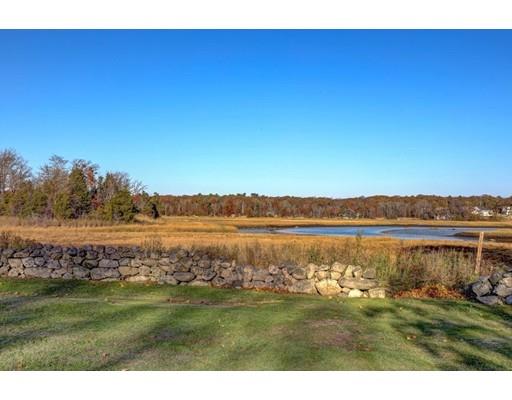 392 South Main Street Cohasset, MA 02025 - Photo 35 of 41 a view of a lake with houses in the background