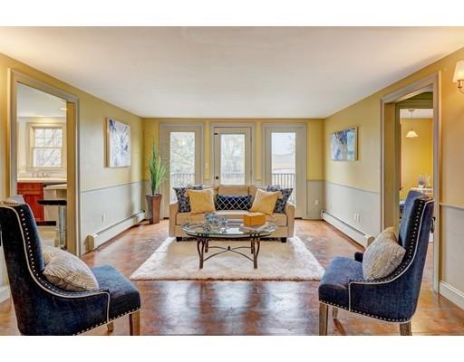 392 South Main Street Cohasset, MA 02025 - Photo 4 of 41 a living room with furniture and a large window