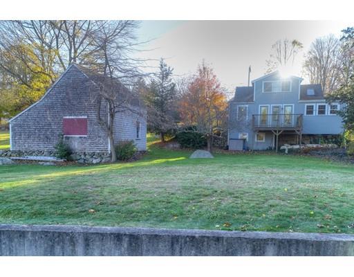 392 South Main Street Cohasset, MA 02025 - Photo 41 of 41 a view of a house with a yard and a large tree