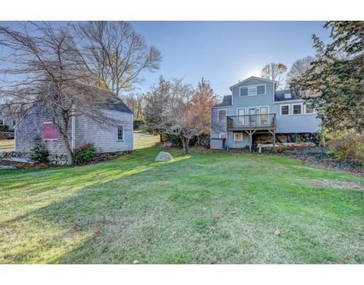392 South Main Street Cohasset, MA 02025 - Photo 8 of 41 a view of a house with a yard and sitting area