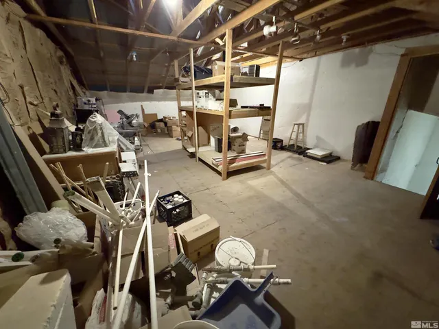 a view of a street with a car parked in front of it