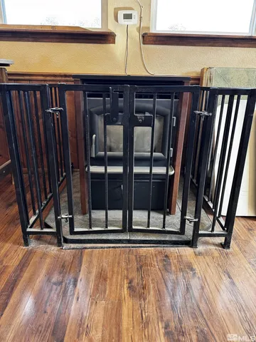 a view of outdoor space with wooden floor