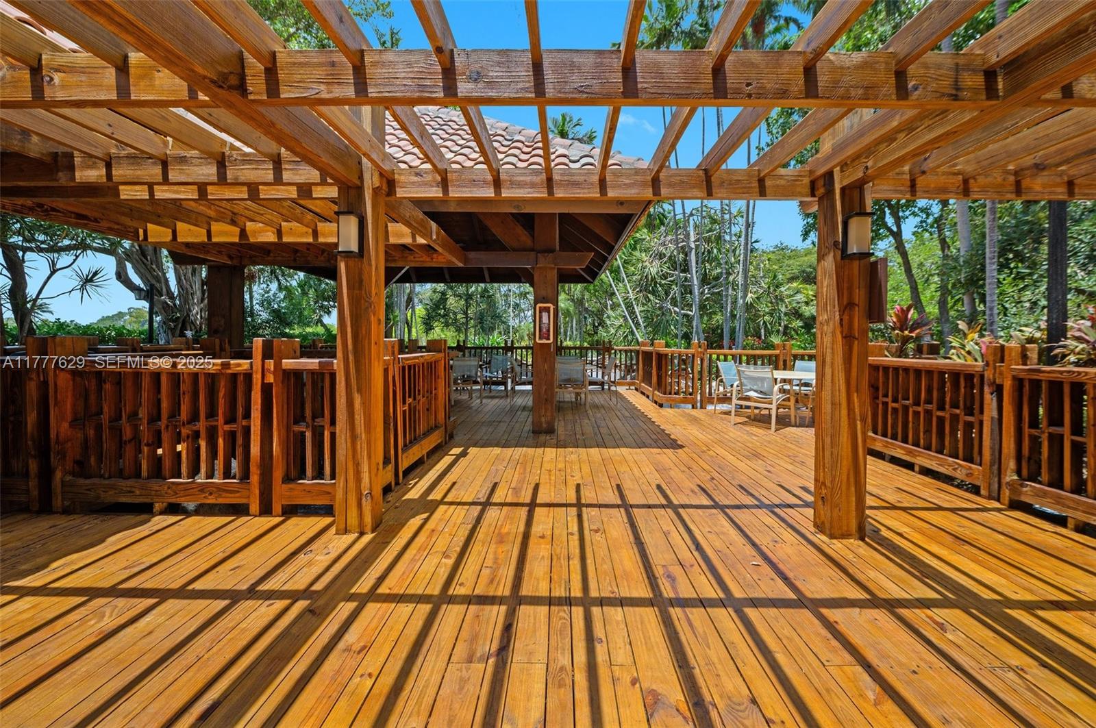 2000 Towerside Terrace, Unit 805 Miami, FL 33138 - Photo 24 of 47 a view of outdoor space with wooden floor