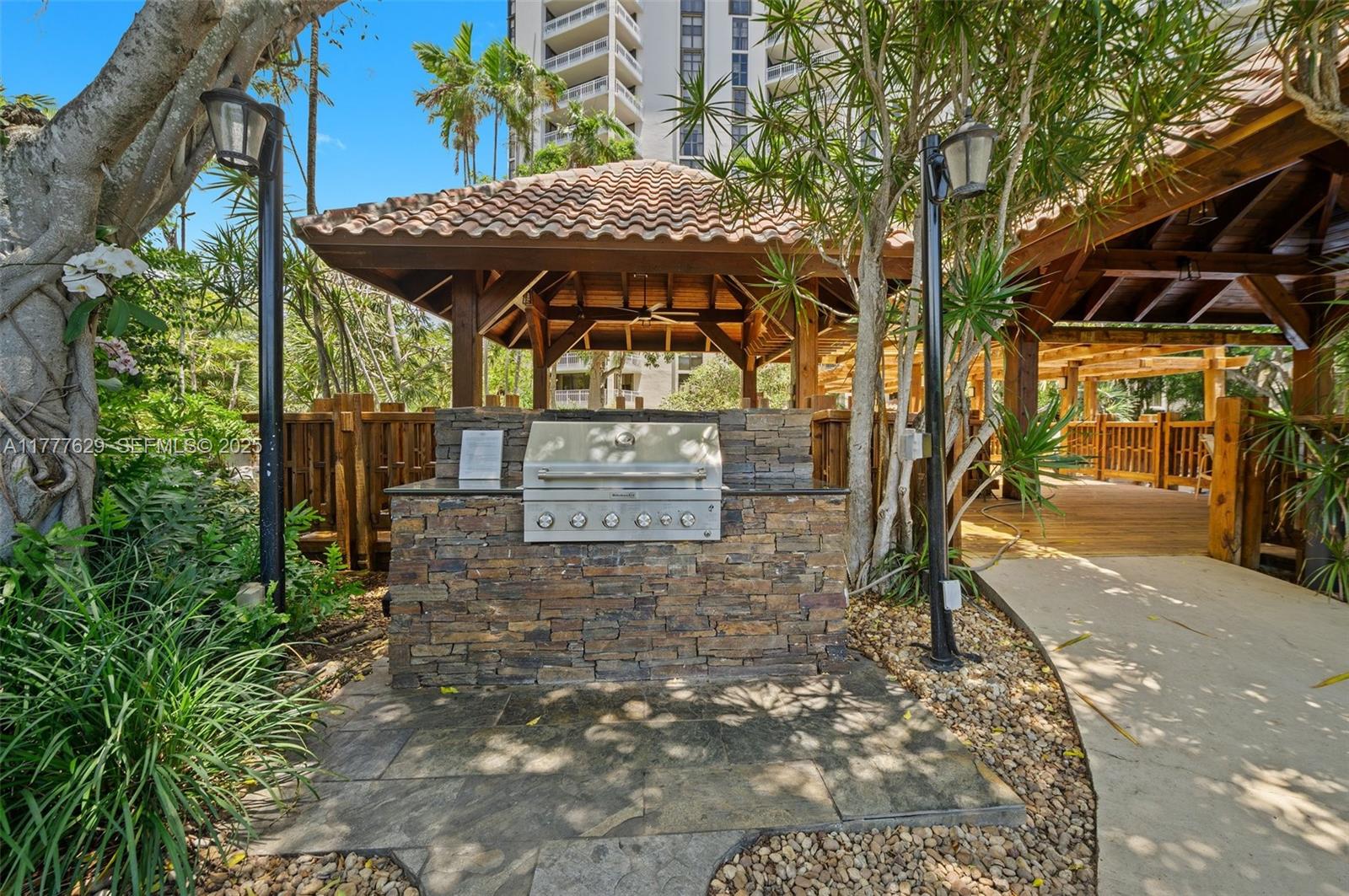 2000 Towerside Terrace, Unit 805 Miami, FL 33138 - Photo 25 of 47 a view of outdoor space with a patio