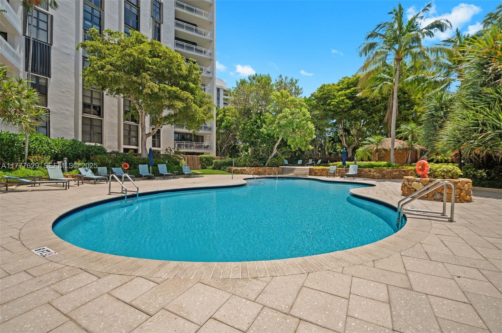 2000 Towerside Terrace, Unit 805 Miami, FL 33138 - Photo 29 of 47 a view of outdoor space yard swimming pool and patio