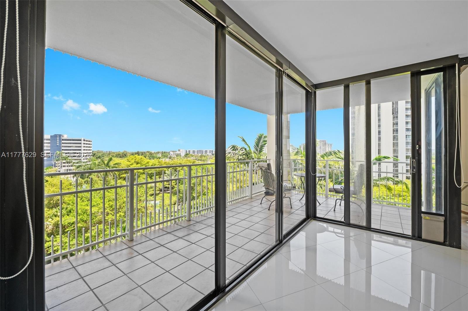 2000 Towerside Terrace, Unit 805 Miami, FL 33138 - Photo 4 of 47 a view of an entryway with balcony
