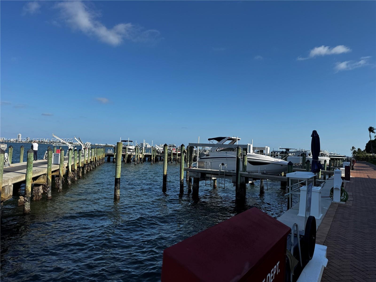 2000 Towerside Terrace, Unit 805 Miami, FL 33138 - Photo 41 of 47 a view of a terrace with chairs