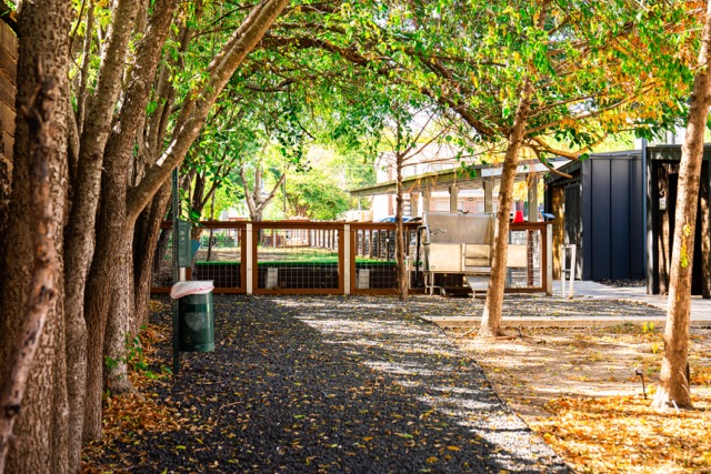 2505 Thornton Road, Unit 2106 Austin, TX 78704 - Photo 30 of 40 a view of a park with iron fence and large trees