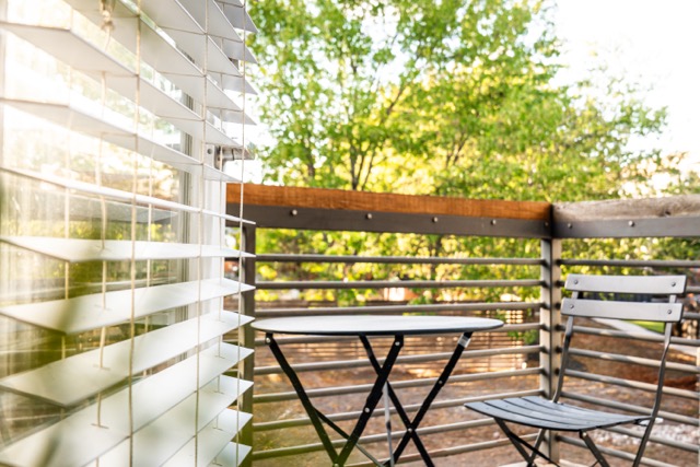 2505 Thornton Road, Unit 2106 Austin, TX 78704 - Photo 3 of 40 a view of a chairs and table in a patio