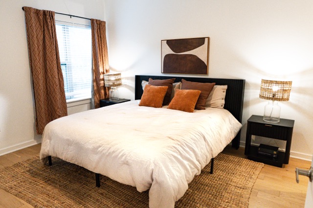 2505 Thornton Road, Unit 2106 Austin, TX 78704 - Photo 7 of 40 a large bed sitting in a bedroom next to a window