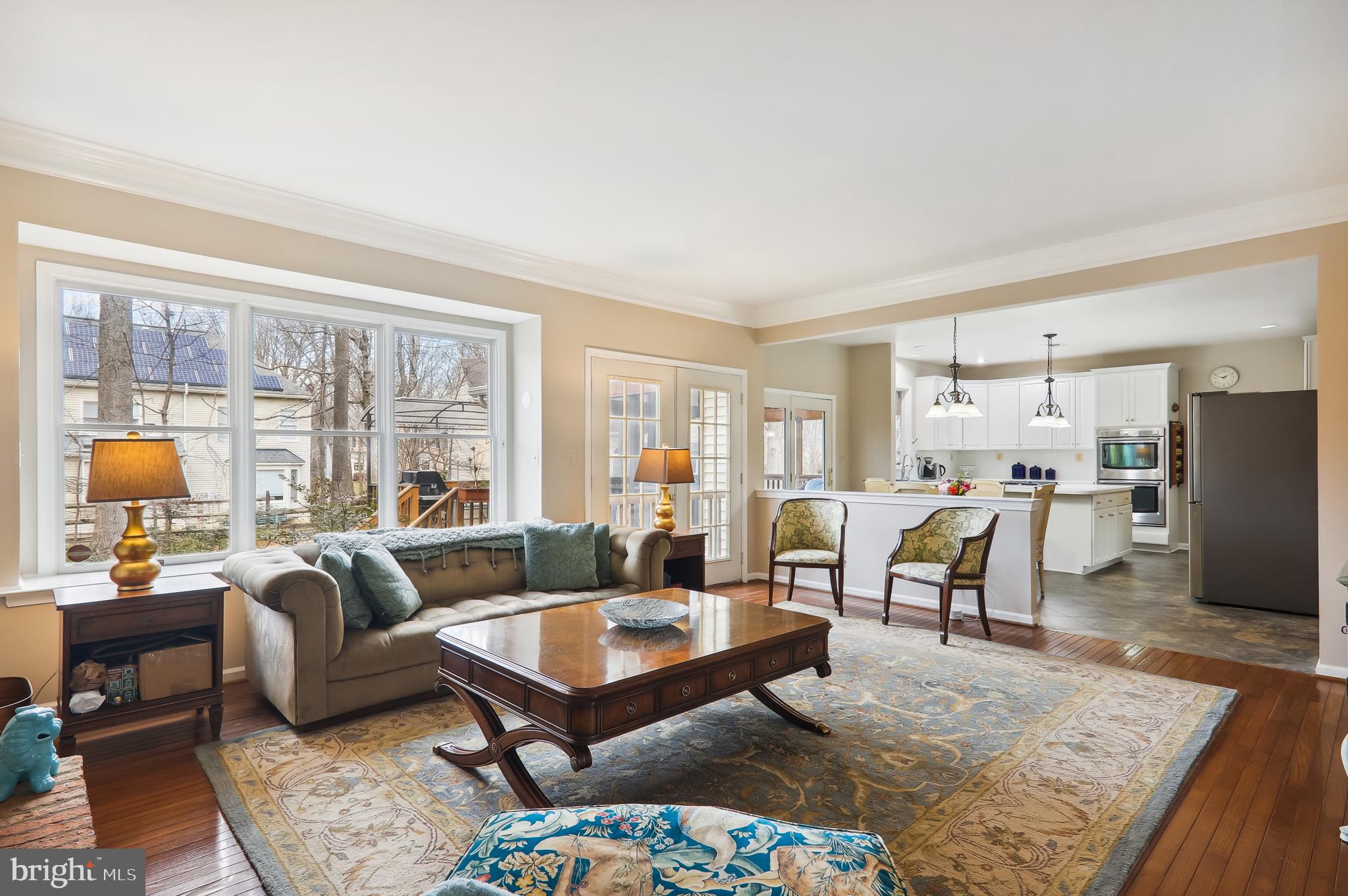 8001 Boulder Ridge Way Gaithersburg, MD 20882 - Photo 22 of 89 Family room has triple windows to the back