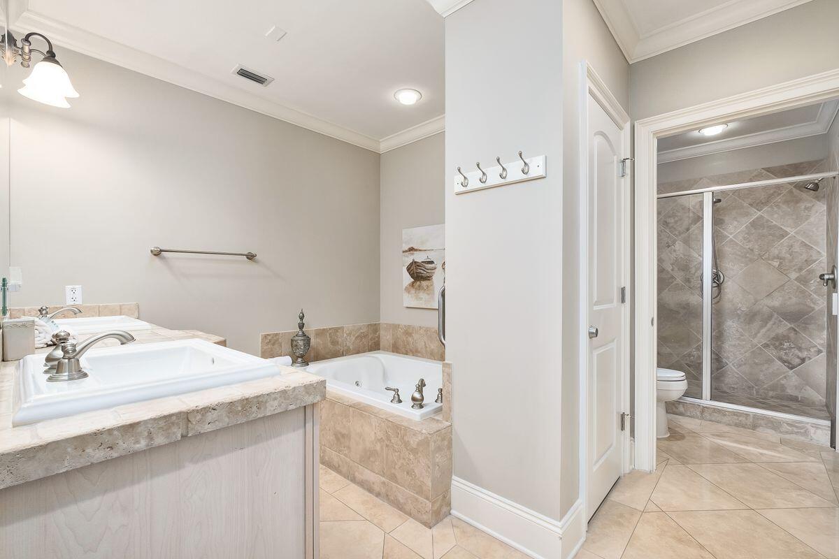2421 West County Highway 30A, Unit E305 Santa Rosa Beach, FL 32459 - Photo 14 of 39 a en suite bathroom with a sink mirror and shower