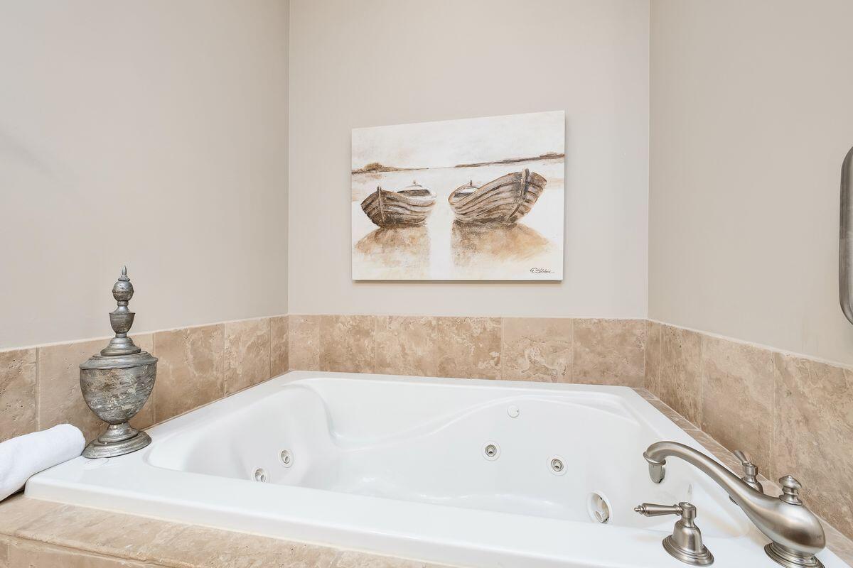 2421 West County Highway 30A, Unit E305 Santa Rosa Beach, FL 32459 - Photo 16 of 39 a bathroom with a bathtub