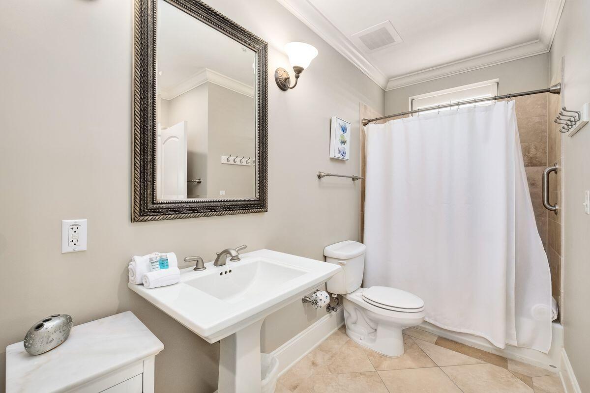 2421 West County Highway 30A, Unit E305 Santa Rosa Beach, FL 32459 - Photo 21 of 39 a bathroom with a sink toilet and shower