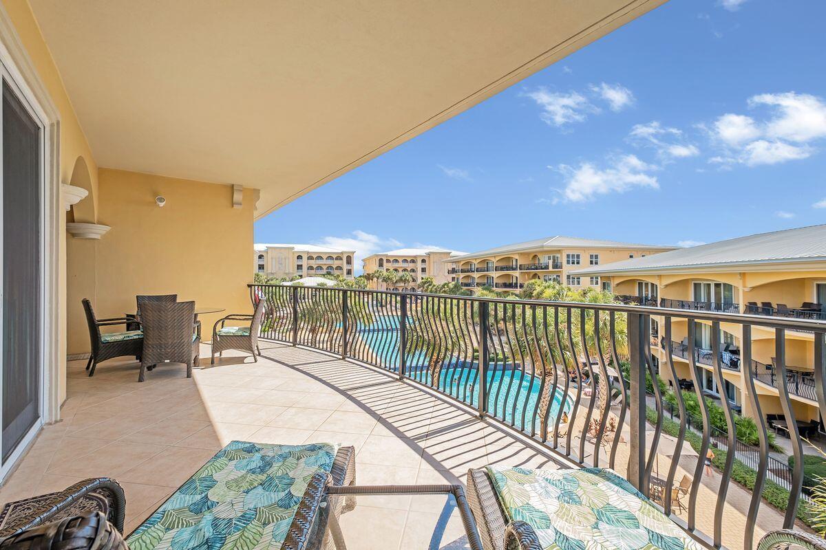 2421 West County Highway 30A, Unit E305 Santa Rosa Beach, FL 32459 - Photo 27 of 39 a balcony with an outdoor space