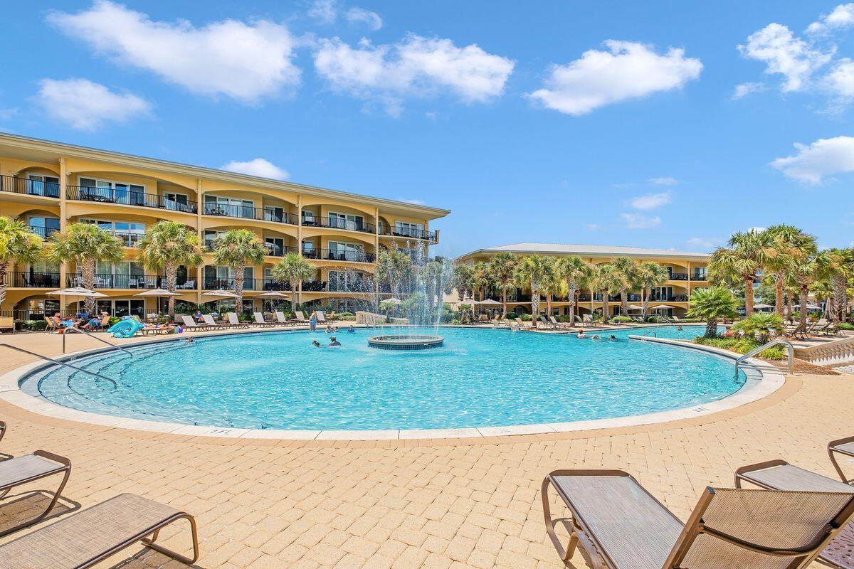2421 West County Highway 30A, Unit E305 Santa Rosa Beach, FL 32459 - Photo 33 of 39 a view of outdoor space swimming pool and outdoor seating