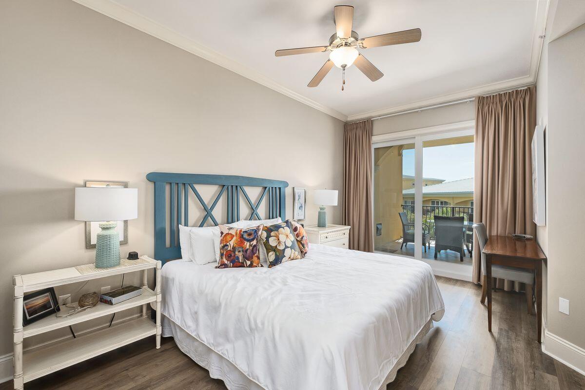 2421 West County Highway 30A, Unit E305 Santa Rosa Beach, FL 32459 - Photo 10 of 39 a bedroom with a bed and a window