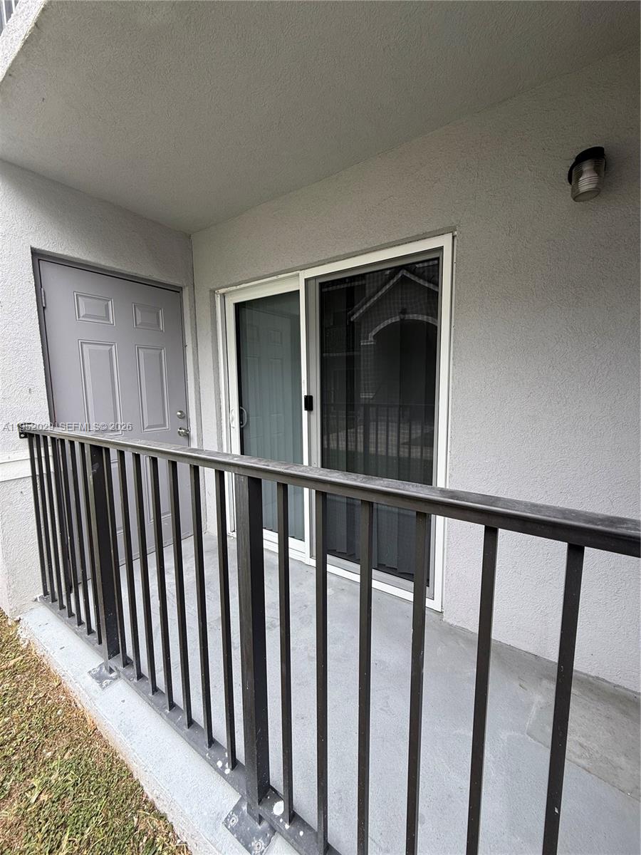 15410 Southwest 284th Street, Unit 8104 Homestead, FL 33033 - Photo 20 of 25 a view of a balcony